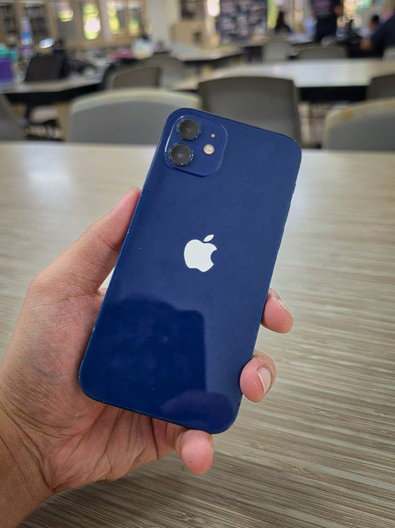 Rush Sale iPhone 12 64Gb Blue (Category: iPhone 12 Series) located in Minalin. Submitted by yanhz30 (Listing ID 1441499876, Image 1). Description: RUSH SALE FU iPhone 12 64GB Blue - all parts original including lcd, battery, back glass, etc ✅️ truetone working ✅️ face id working ✅ ️76 BH ✅️ NTC approved ✅️ Factory Unlock ✅️Open line/no sim restrictions (any sim pwede) ✅️no issue aside from minor paint chips / dents ✅️✅️no repair history Inclusion