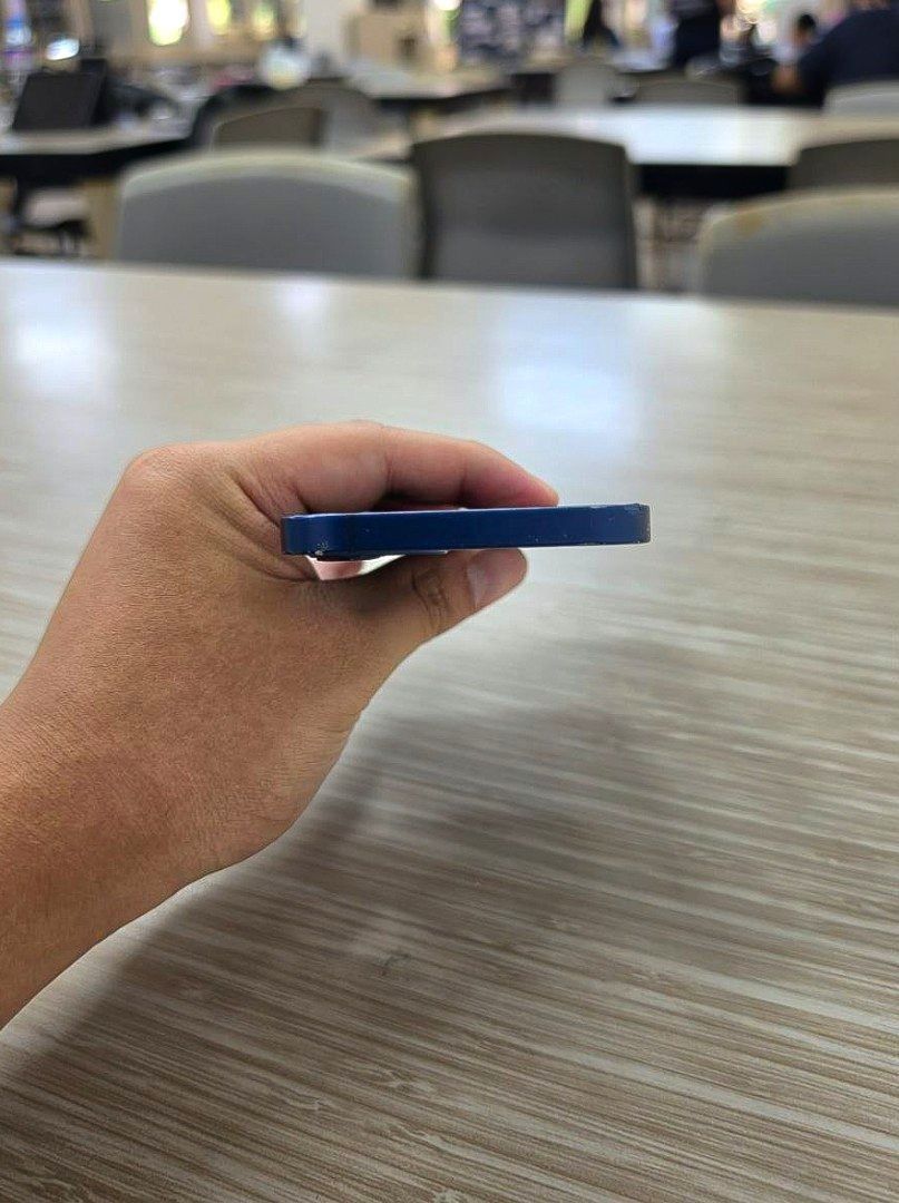 Rush Sale iPhone 12 64Gb Blue (Category: iPhone 12 Series) located in Minalin. Submitted by yanhz30 (Listing ID 1441499876, Image 3). Description: RUSH SALE FU iPhone 12 64GB Blue - all parts original including lcd, battery, back glass, etc ✅️ truetone working ✅️ face id working ✅ ️76 BH ✅️ NTC approved ✅️ Factory Unlock ✅️Open line/no sim restrictions (any sim pwede) ✅️no issue aside from minor paint chips / dents ✅️✅️no repair history Inclusion