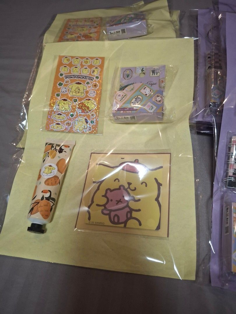 Sanrio Themed Giveaways Take All 14 Sets (Category: Stationery & School Supplies) located in Cavite. Submitted by f2squared_2nd_account (Listing ID 1441491658, Image 2). Description: RFS: These are extra's from my daughter's birthday party 14 sets with 4-5 items per set Details: 5 Sets of Kuromi - Bracelet or Nailcutter - Sticker - Ballpen - Mini Notebook - Purple Washi Tape (Not a Sanrio Design) 5 Sets of Pompompurin - Sticker - Hand Lotion (Man