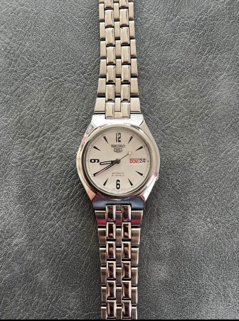 Seiko 5 Automatic Watch Silver Stainless Steel (Category: Men's Watches) located in Manila. Submitted by reggiebatiancila (Listing ID 1441548230, Image 1). Description: Selling a Seiko 5 automatic watch. Silver dial with day and date function. Stainless steel band. Works well. Great for everyday wear. Let me know if you have questions..