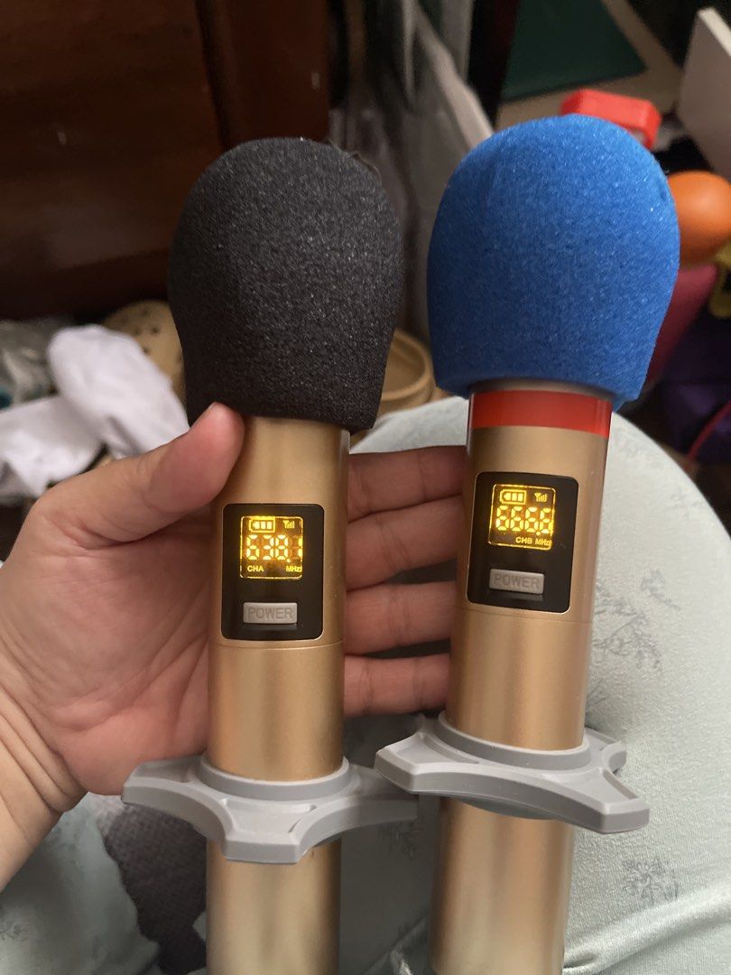 Shure Wireless Rechargeable Microphones with Case (Category: Microphones) located in Las Pinas. Submitted by frugalmama (Listing ID 1441400541, Image 3). Description: - Shure Wireless Rechargeable Microphone Set - Includes 2 microphones with distinct black and blue windscreens - Comes with a convenient charging dock - Protected by a durable hard carrying case - Manual included for easy setup - Ideal for performances, events, and presentations.