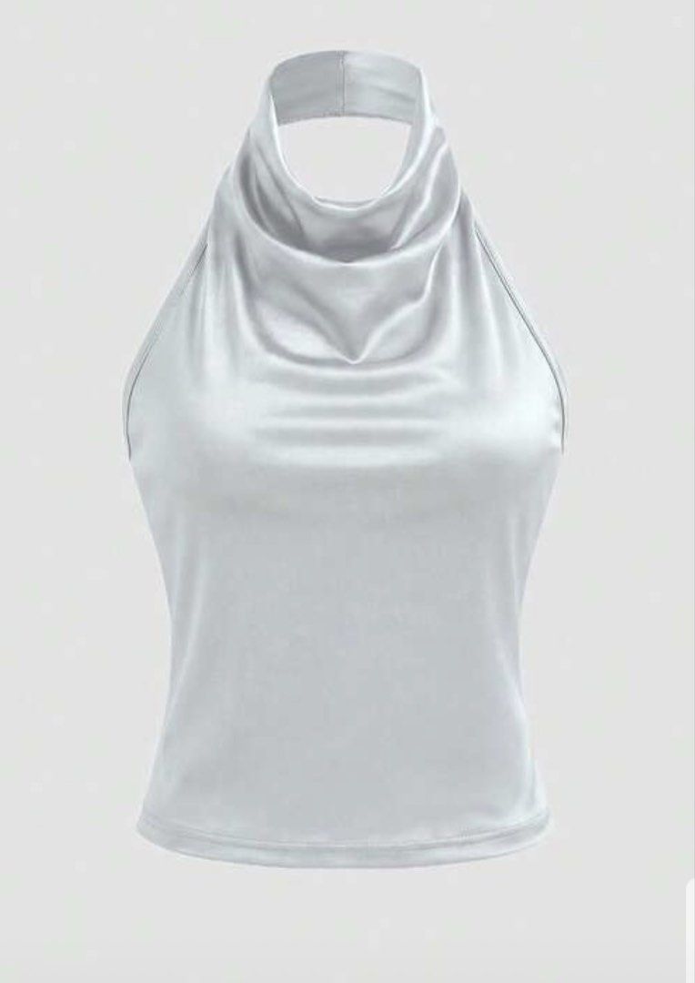 Silver Turtleneck Halter Party Top (Category: Sleeveless) located in Paranaque City. Submitted by bymuse.co (Listing ID 1441466049, Image 1). Description: Rfs: used for one event .