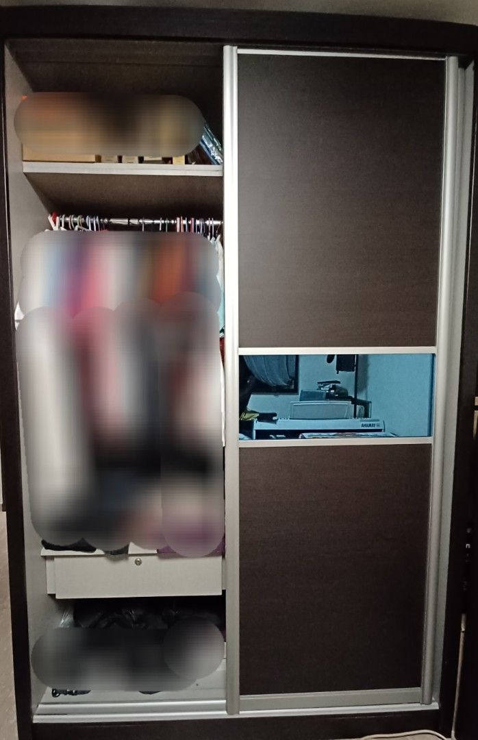 Sliding Door Wardrobe with Mirror Panel (Category: Shelves, Cabinets & Racks) located in Singapore. Submitted by j_heaven (Listing ID 1441511031, Image 2). Description: - 152 (L) x 240 (H) x 60 (D) - $50 (1 wardrobe) or $80 (2 wardrobes) - 2 x Dark brown sliding door wardrobe - 2nd Wardrobe both left & right side is the same in photo 2 - Horizontal mirror panel in the middle - Dark wood frame with silver aluminum trim. Made of durable plywood. - 