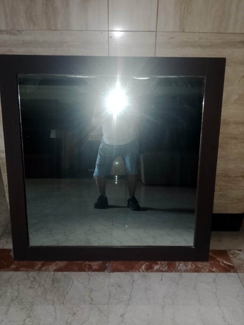 Square Mirror with Dark Brown Frame (Category: Mirrors) located in Las Pinas. Submitted by jesus1smysavi0r (Listing ID 1441582490, Image 2). Description: - Square mirror with a sleek dark brown frame. - Can be hung on a wall or placed on a surface. - Ideal size for bedrooms, entryways, or hallways. - Provides clear and excellent reflection. - Simple, modern frame design complements various decor styles. also available in natural color.