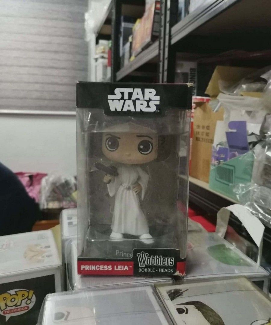 Star Wars Princess Leia Wobblers Bobble-Head (Category: Figurines & Statues) located in San Pedro. Submitted by oopsiboughtanotherpop-oibap (Listing ID 1441415544, Image 1). Description: - Star Wars Princess Leia Wobbler bobble-head - Comes in original packaging - Ideal for any Star Wars fan's collection - Fun and collectible figure Bad box.