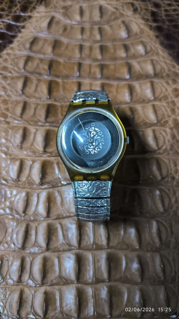 Swatch Strap Antiquite original for collectors (Category: Everything Else Others) located in Manila. Submitted by ddxdd (Listing ID 1441465813, Image 1). Description: - Swatch watch strap - Features a unique skeleton dial with intricate detailing - Stretchy gold tone strap - Classic piece -watch not working.