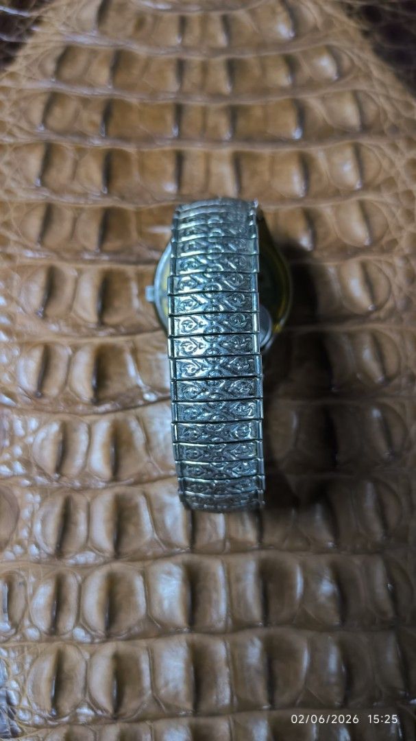Swatch Strap Antiquite original for collectors (Category: Everything Else Others) located in Manila. Submitted by ddxdd (Listing ID 1441465813, Image 2). Description: - Swatch watch strap - Features a unique skeleton dial with intricate detailing - Stretchy gold tone strap - Classic piece -watch not working.