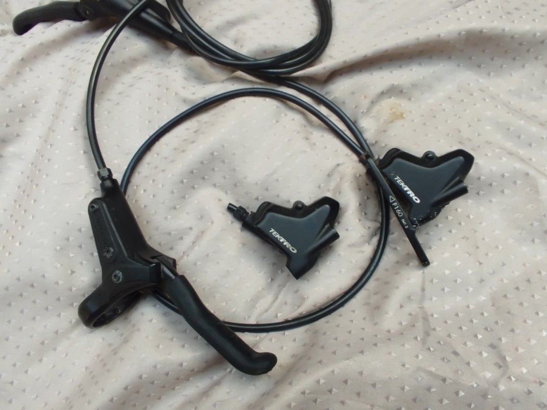 Tektro Hydraulic Disc Brake Levers and Calipers Set (Category: Bicycles) located in Taytay. Submitted by radix1984 (Listing ID 1441575726, Image 2). Description: Flat Mount Tektro Hydraulic Brakes. 1200 pesos only. - Came from Giant City Bike - Used but not abused. - Had to detach rear caliper. - Taytay Area .