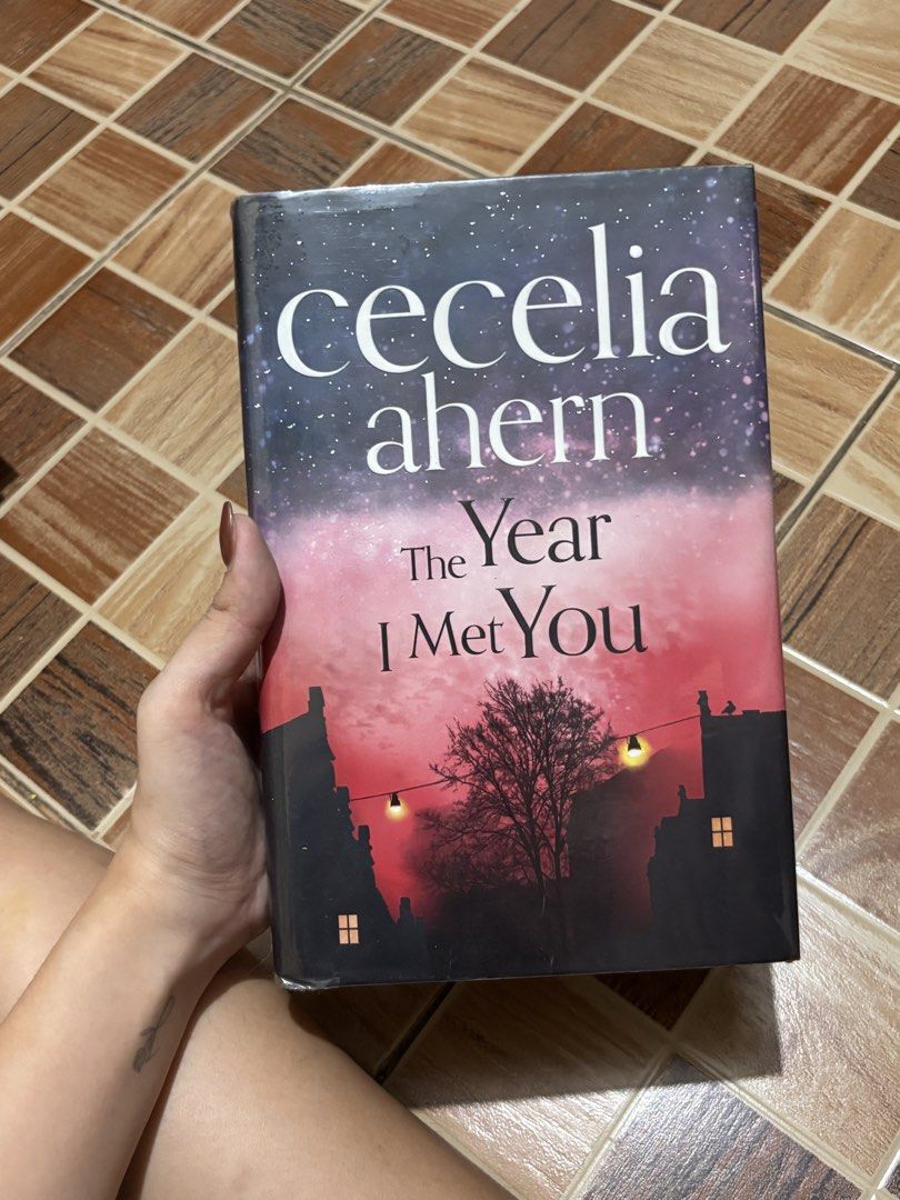The Year I Met You by Cecelia Ahern (Category: Storybooks) located in Bulacan. Submitted by prelovedbyjoana (Listing ID 1441558118, Image 1). Description: - Book Title: The Year I Met You - Author: Cecelia Ahern - Genre: Emotional Story - Cover Description: Beautiful night sky with pink glow, silhouetted buildings, bare tree, and string lights. - Recommended for fans of captivating and emotional reads..