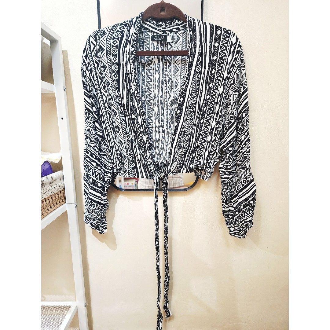 Tie-Front Cropped Cardigan (Category: Coats, Jackets and Outerwear) located in Mandaluyong City. Submitted by aaa25 (Listing ID 1441525359, Image 1). Description: - Free when you spend atleast 600 here (1x avail only) - Coverup - Very good condition - Small to Medium.