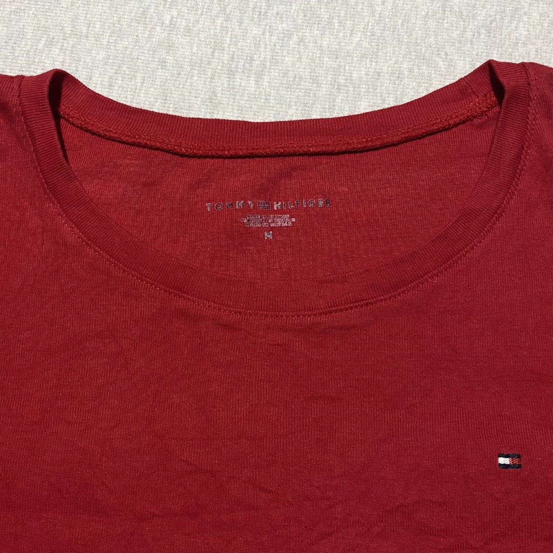 Tommy Hilfiger (Category: Longsleeves) located in Mabalacat. Submitted by stylists.market (Listing ID 1441580750, Image 2). Description: Length : 23 Width : 15 Condition : 9/10 EMBROIDERED LOGO ♥️ COMPLETE TAGS SUPER NICE FITTING VERY COMFY & SMOOTH ON SKIN RED COLOR SA LIGHTING LANG PO KAYA MEDJO HINDI MA-JUSTIFY NEED WASH NO MAJOR STAIN FRESH FROM BALE.