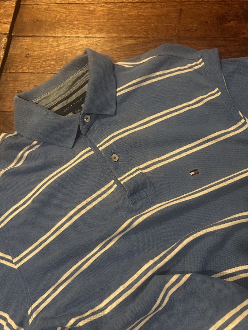 Tommy Hilfiger Blue Polo Tshirt (Category: Tshirts & Polo Shirts ) located in Manila. Submitted by lee4sale (Listing ID 1441538842, Image 1). Description: W21 L29 some white spots.