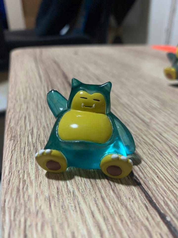 Tomy Pokemon Snorlax Figure - Blue Translucent (Category: Figurines & Statues) located in Manila. Submitted by kkotb (Listing ID 1441408979, Image 1). Description: - Adorable translucent blue Snorlax figure - Posed sitting and waving - Ideal for any Pokemon fan's collection - Small, collectible size.