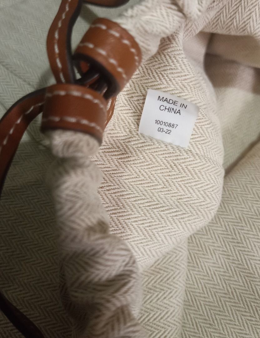 ⚜️Tory Burch String Bucket Bag (Category: Luxury Bags & Wallets) located in Manila. Submitted by 74_tiger (Listing ID 1441471165, Image 3). Description: Item: Tory Burch String Bucket Bag Condition: Like New Material: Canvas Color: Light Mocca Approx Measurement: W - 14" x H - 12.5" 💯% Authentic Pre - Owned Good As New Never Got The Chance To Use It Handy, Can Fit A Lot Inside LAST PRICE POSTED!!!! .