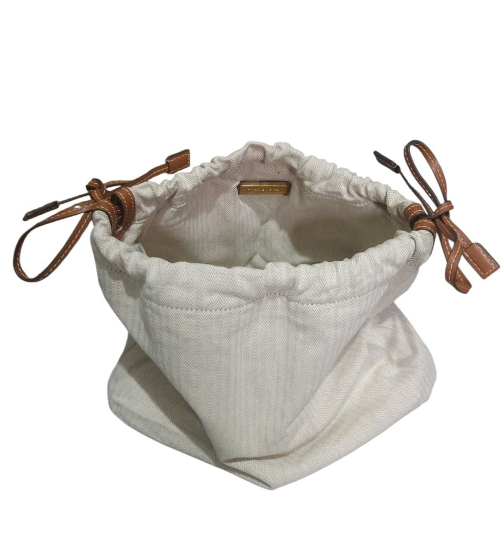 ⚜️Tory Burch String Bucket Bag (Category: Luxury Bags & Wallets) located in Manila. Submitted by 74_tiger (Listing ID 1441471165, Image 1). Description: Item: Tory Burch String Bucket Bag Condition: Like New Material: Canvas Color: Light Mocca Approx Measurement: W - 14" x H - 12.5" 💯% Authentic Pre - Owned Good As New Never Got The Chance To Use It Handy, Can Fit A Lot Inside LAST PRICE POSTED!!!! .