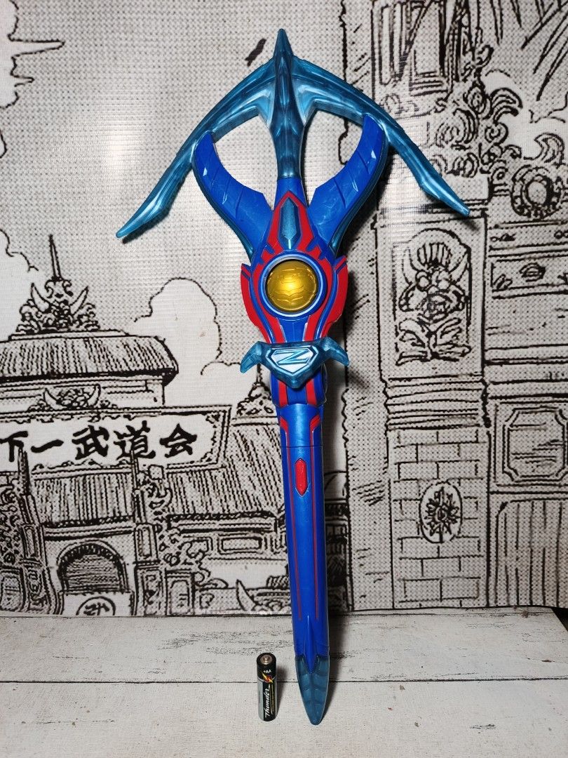 Ultraman Z Arrow Collectable toys (Category: Figurines & Statues) located in Iloilo. Submitted by quistor (Listing ID 1441508414, Image 3). Description: Product Features: Ultraman Z DX Arrow collectable Toys Color: as the picture shows Size: 20 inches - see battery 2 inches for size comparison Condition: Japan Surplus Toys, authentic Bandai , no box, working Electronic, selling as is. Package Content: 1pc. Notes: Due to the light and screen setti