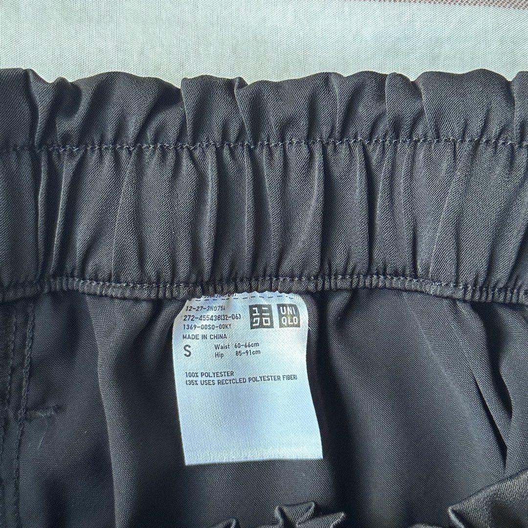 Uniqlo Black Satin Drawstring Shorts (Category: Shorts) located in Davao. Submitted by beys.corner (Listing ID 1441488646, Image 3). Description: - Brand: Uniqlo - Color: Black - Material: 100% Polyester - Features: Drawstring waist, pockets - Size: S - Ideal for: Casual wear, lounging.