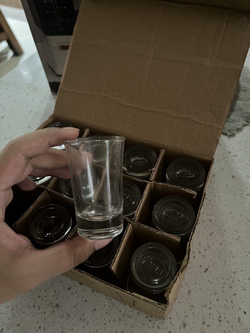 UTD 12 Pieces Shot Glasses Set (Category: Dinnerware & Cutlery) located in Manila. Submitted by jiden26 (Listing ID 1441405016, Image 3). Description: - Set of 12 UTD shot glasses - Clear glass with a simple, elegant design - Perfect for parties, gatherings, or personal use - Includes original box with protective dividers - Great for serving spirits or as small tasting glasses.