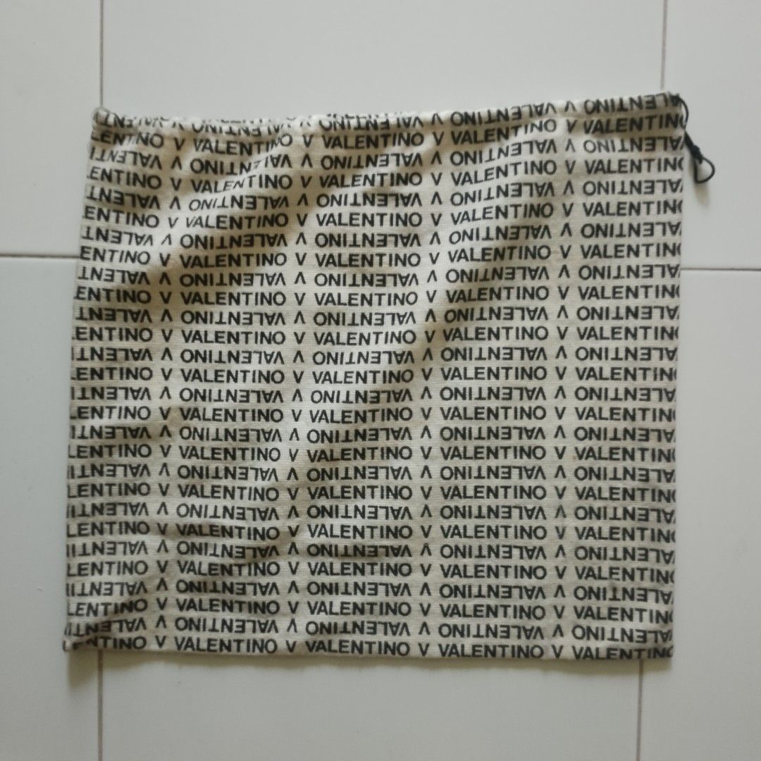 Valentino "AOP" Dust Bag (Category: Luxury Bags & Wallets) located in Calumpit. Submitted by BCHThriftShop (Listing ID 1441506969, Image 2). Description: Note: Pls! Refer to the dimensions for proper fit🔥 📌Dimes : L=17.5 in. W=15 in. 📌Issue : N/A 📌Color rate : 9.2/10 📌Condition: Excellent 📍Due to the brightness, the photo may differ from the actual one💡 🙏Pls! message us if you need further informationℹ️ 🙏Please! keep in mind that this it
