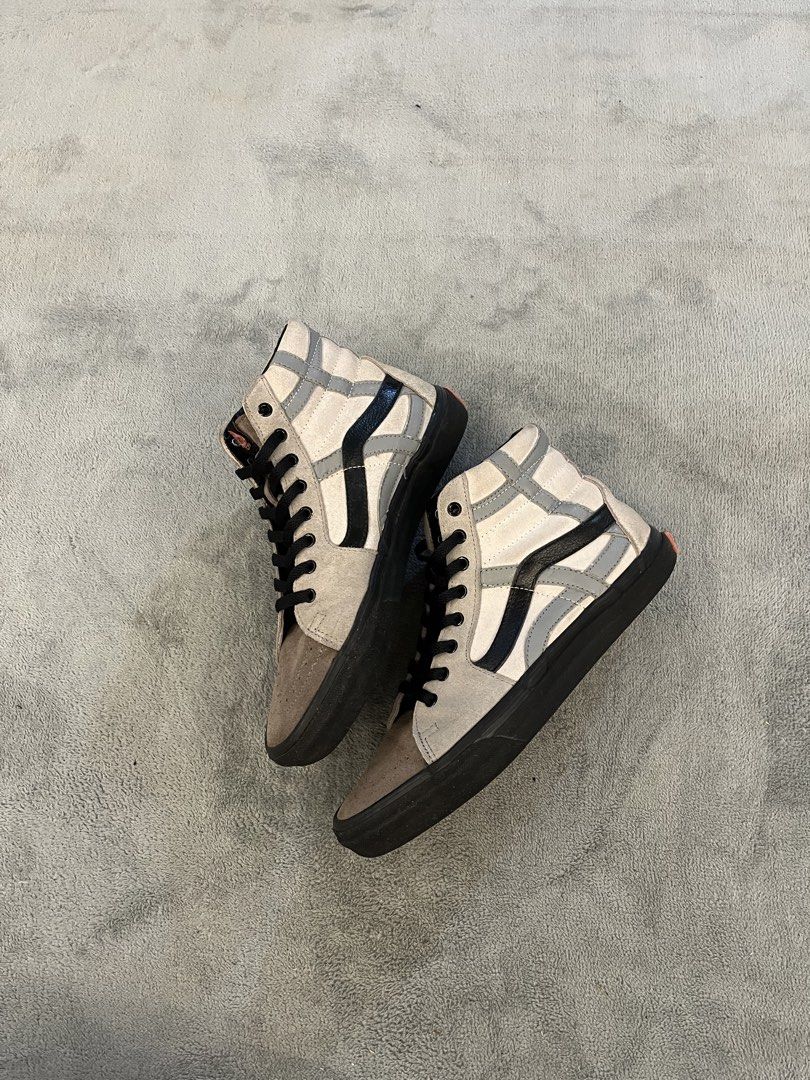 Vans Sk8-Hi Sneakers Zhao Zhao (Category: Sneakers) located in Quezon City. Submitted by markieexp (Listing ID 1441427345, Image 2). Description: - Vans Sk8- High-Top Sneakers - Size: US Men's 9 / US Women's 10.5 - Material: Suede and Canvas Upper - Colorway: Neutral with classic Vans side stripe - Laces & Soles: Black - Condition: Soles show some dirt from normal wear.