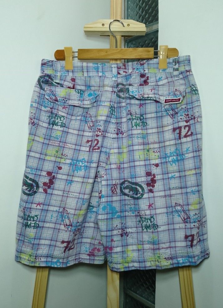 Vintage ECKO UNLTD. Plaid Graffiti Print Shorts (Category: Shorts) located in Manila. Submitted by patrickjos06722 (Listing ID 1441568618, Image 2). Description: - Brand: ECKO UNLTD. - Design: Plaid and graffiti print with all-over rhino logo. - Closure: Zip fly. - Pockets: Two back pockets. - Style: Great for casual wear, unique design. - Condition: Please check photos for details. - Unique and rare print.