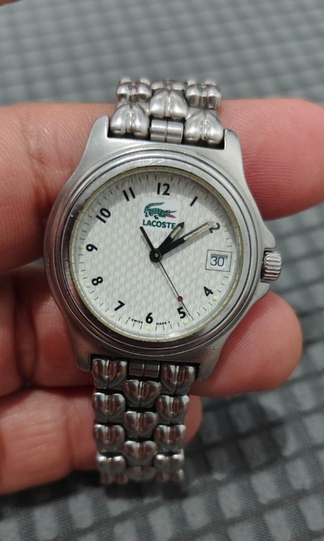 Vintage lacoste Swiss Made (Category: Women's Watches) located in Cebu City. Submitted by aceoftime (Listing ID 1441562347, Image 1). Description: Pre-owned In good working condition Ref: 3000J Precise swiss quartz movt w/ date display All in stainless steel case & bracelet Watch only Our Guarantee: 💯 Authentic All watches are checked by our experienced tech to ensure good functionality Please manage your expectations since these are preloved wa