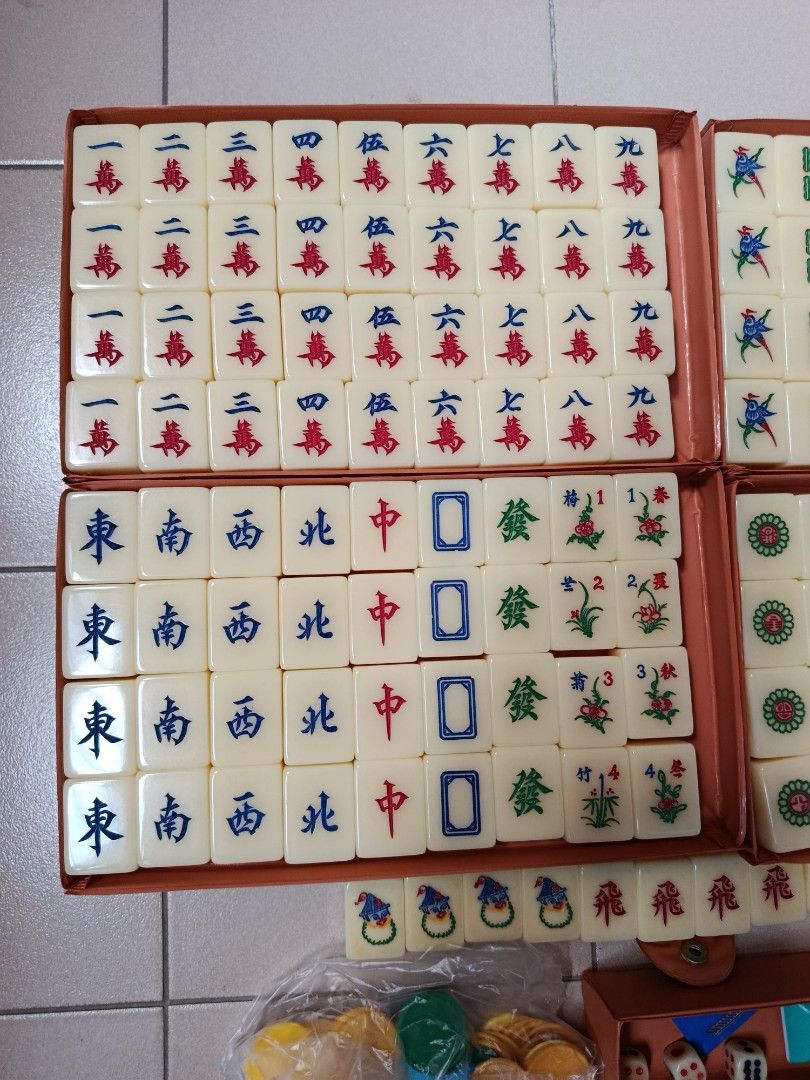 Vintage Mahjong Set with Case (Category: Toys & Games) located in Singapore. Submitted by karhar99 (Listing ID 1441462716, Image 3). Description: - Complete Mahjong set 160 tiles - Includes animals, joker head, 飛 and blank tiles - Comes with brown carry case, dice, wind direction indicator and chips - deal at Bukit batok mrt or 65018x.