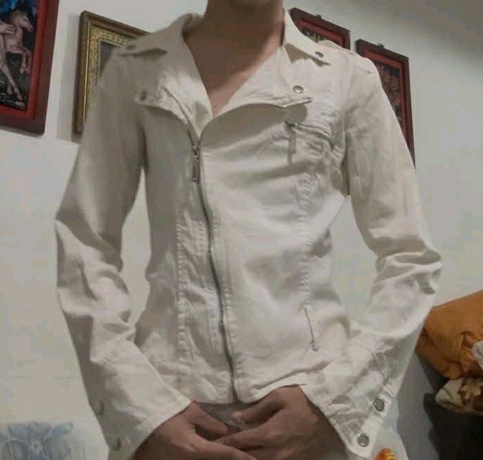 White Asymmetrical Jacket (Category: Coats, Jackets and Outerwear) located in Manila. Submitted by lovely.453 (Listing ID 1441394792, Image 1). Description: - Cool white biker jacket - Asymmetrical zip front closure - Zippered chest pocket - Button details on cuffs - Ideal for layering.