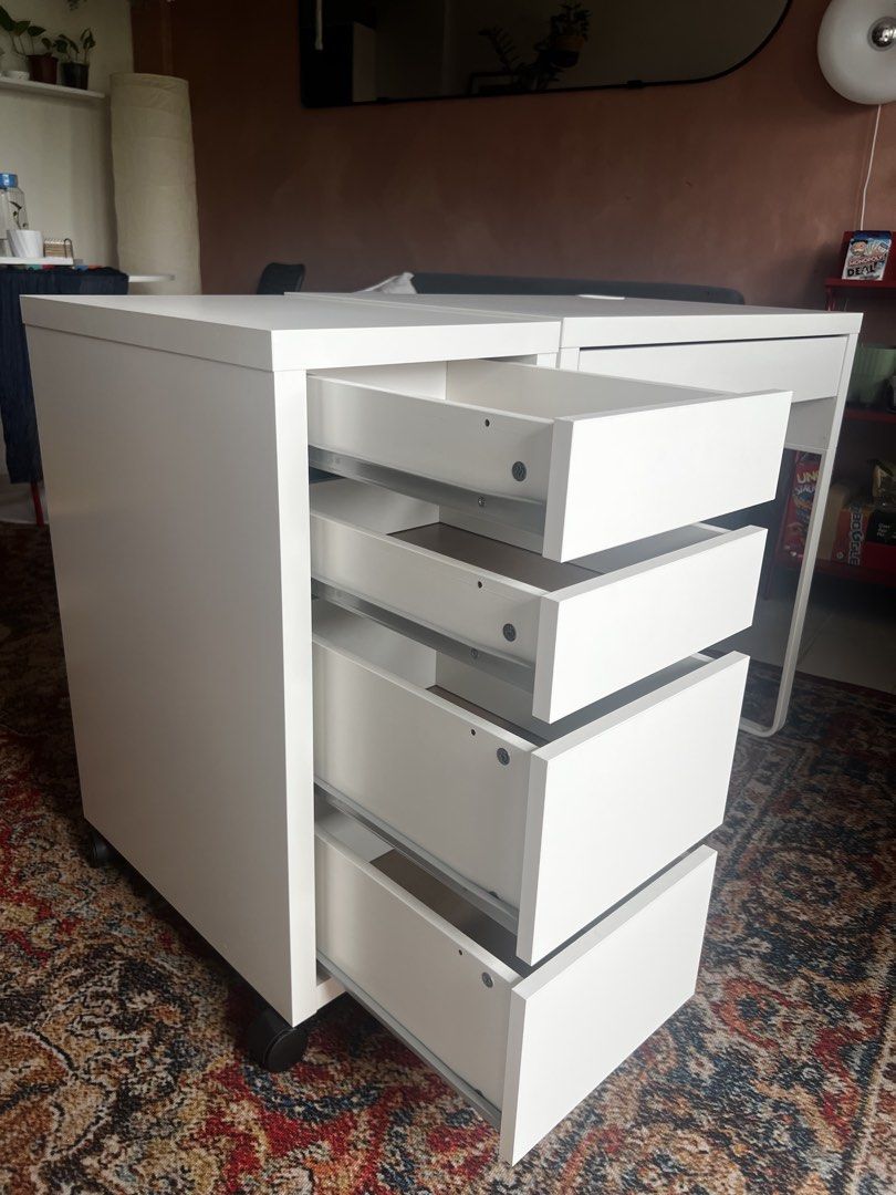 White IKEA Micke table and drawer set (Category: Shelves, Cabinets & Racks) located in Mandaluyong City. Submitted by ampyyyyb (Listing ID 1441440926, Image 3). Description: Micke Table and Drawer set. Only bought last December, will give the receipt along with the furniture so you can still have the option to return it and have the money for yourself if you change your mind. This is good as new, no damage or signs of use. I’ve disinfected and cl