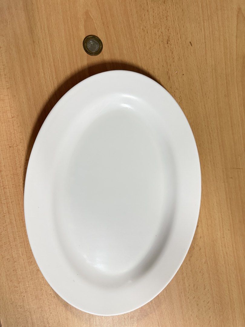 White Oval Serving Plate with Coin for Scale