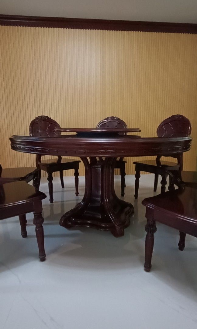 Wood Round Table w/ Turntable and 8 chairs (Set) (Category: Tables & Sets) located in Cavite. Submitted by jocelb.t (Listing ID 1441441613, Image 2). Description: wood 8 chairs wood round table (glass on top) wood turn table (glass on top) no issue or damages location: tagaytay heights subdivision, tagaytay city.