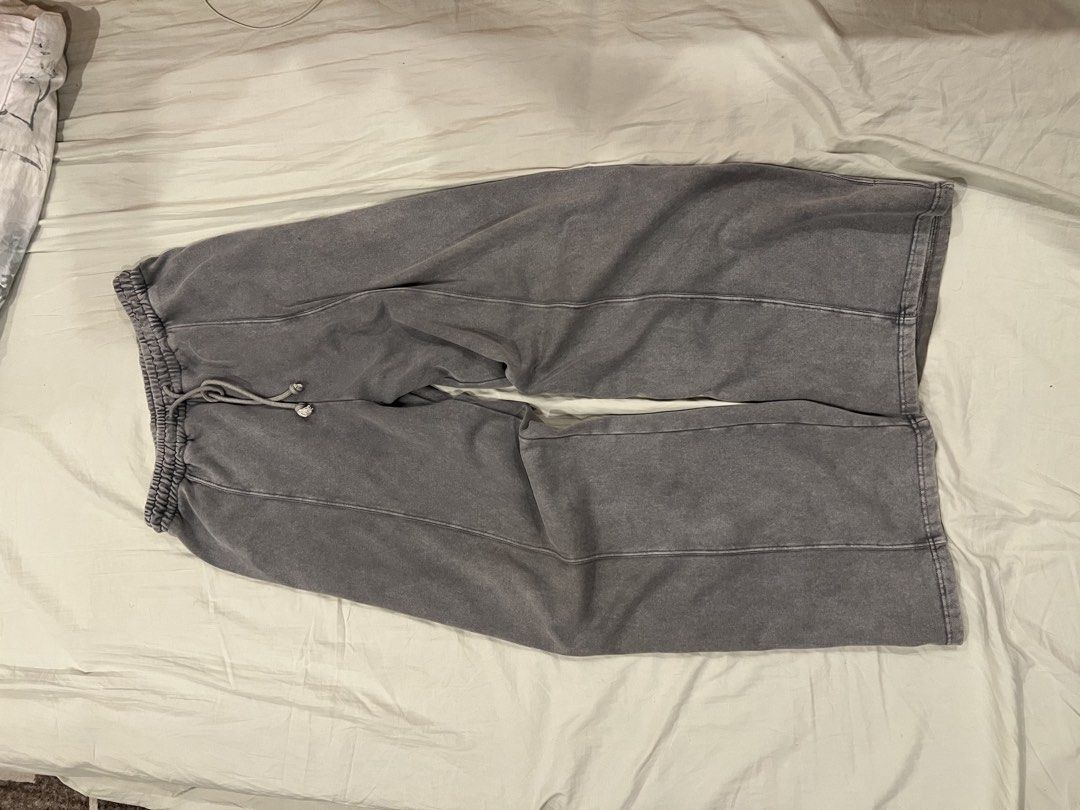 Zara Grey Wide Leg Sweatpants (Category: Other Bottoms) located in Tarlac. Submitted by nostalgia_market (Listing ID 1441502969, Image 1). Description: - Comfy grey sweatpants - Wide leg style - Drawstring waist - Washed-out look - Stitching detail down the front of each leg - Ideal for lounging or casual wear.
