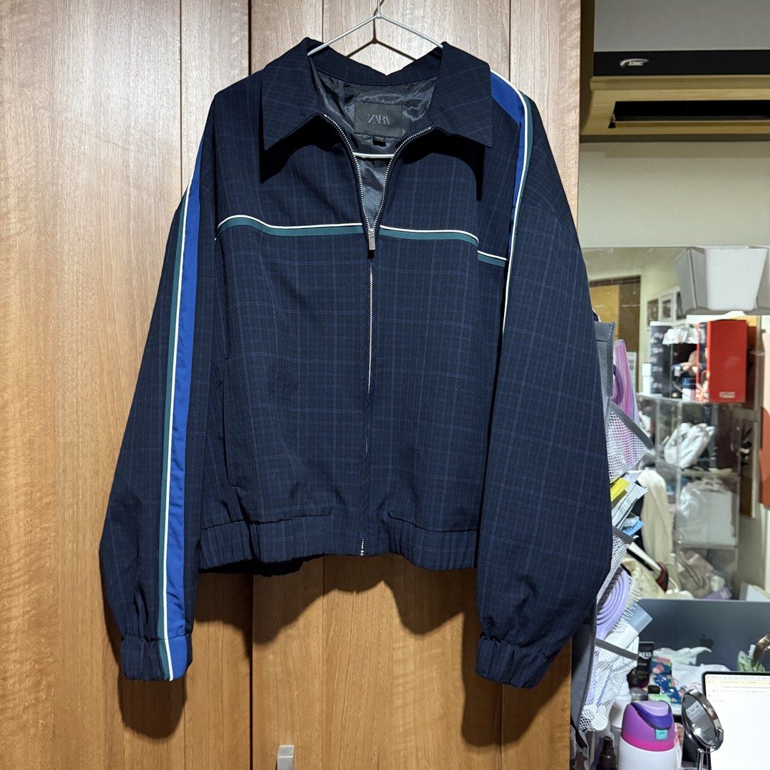 Zara Plaid Zip-Up Jacket with Striped Sleeves (Category: Coats, Jackets and Outerwear) located in Caloocan City. Submitted by paulajoson (Listing ID 1441554434, Image 1). Description: - Used once - Zara jacket with a stylish plaid pattern. - Sporty stripes in blue, green, and white accent the sleeves. - Full zip-up front with a classic collar. - Elasticated cuffs and hem for a comfortable fit. - Ideal for everyday casual wear. - Size: XL, loose f