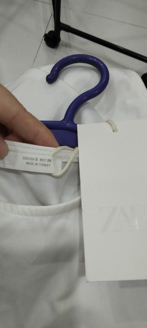 Zara White Sleeveless Bodysuit (Category: Sleeveless) located in Manila. Submitted by jeansuaco942346 (Listing ID 1441391167, Image 3). Description: - Brand: Zara - Type: Sleeveless Bodysuit - Condition: New with tags attached - Origin: Made in Turkey - Style: Simple, classic, and versatile - Wearability: Perfect for layering or wearing solo.