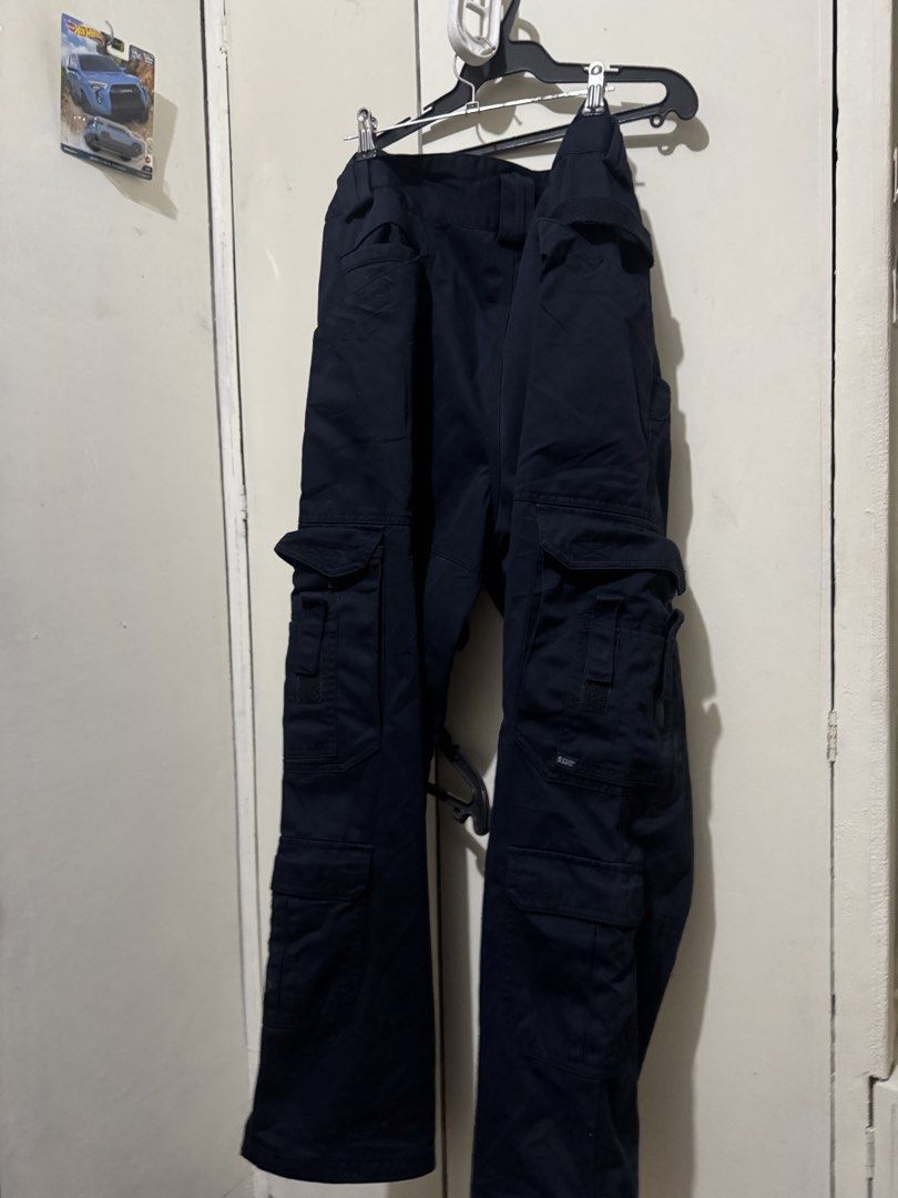 5.11 Tactical Taclite EMS Pants Navy Blue (Category: Jeans) located in Manila. Submitted by wiseearth.075b2f (Listing ID 1444870852, Image 3). Description: - Navy blue 5.11 Tactical Taclite EMS pants -₱1875 -may part na nirepair - Multiple pockets for ample storage - Small tear on the left leg (visible in the last photo) - Ideal for work or outdoor activities - Sold as is.