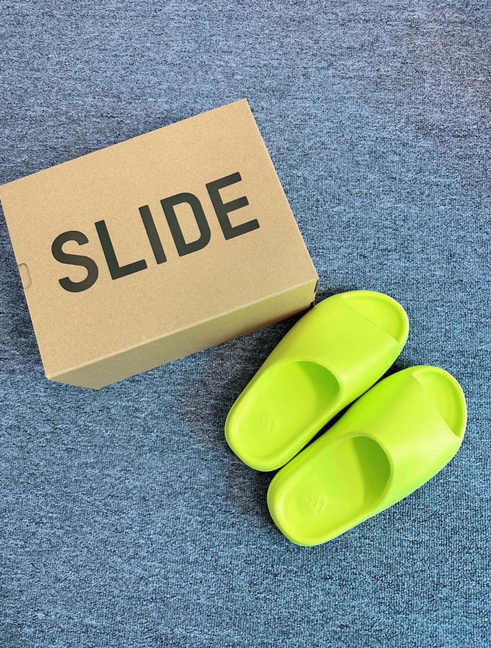 adidas Originals Yeezy Slide Trendy and Slip-on Sandals in Apple Green (Category: Sneakers) located in Singapore. Submitted by nlivewater-1664 (Listing ID 1445008724, Image 2). Description: 🙋 FAQ 1️⃣ What sizes for Adidas adidas Originals Yeezy Slide Trendy and Slip-on Sandals in Apple Green? → Chat me 2️⃣ Shipping? → Free via J&T/Ninja Van 3️⃣ Payment? → Cash on delivery 4️⃣ How to confirm? → Photos in ~3 days Any other questions? 💬.