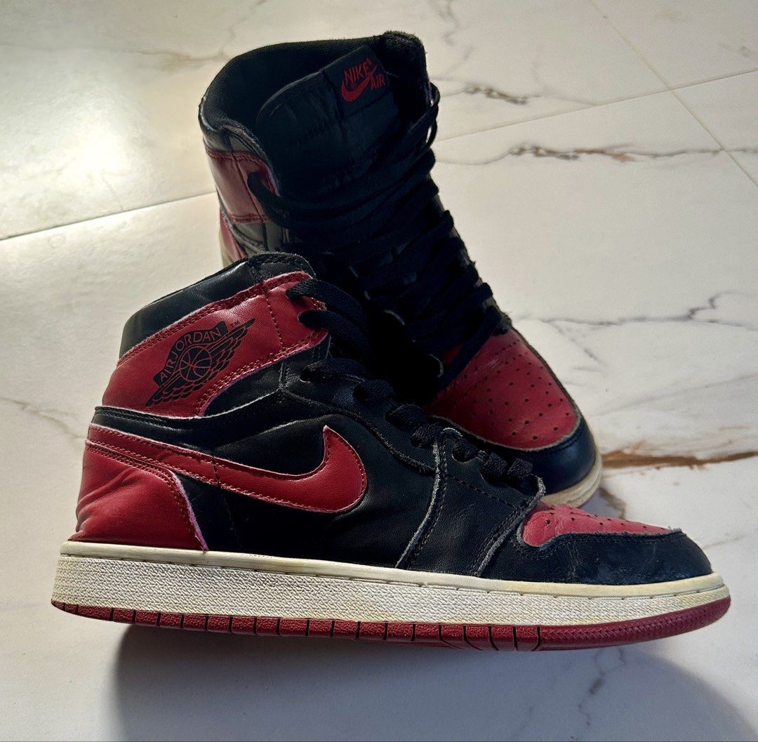 Air Jordan 1 High OG Chicago (Category: Sneakers) located in Candaba. Submitted by shokgold19 (Listing ID 1444894678, Image 2). Description: - Classic Air Jordan 1 High OG Chicago - Black and red leather - Iconic silhouette - Comes with black laces - Perfect addition to any sneaker collection.