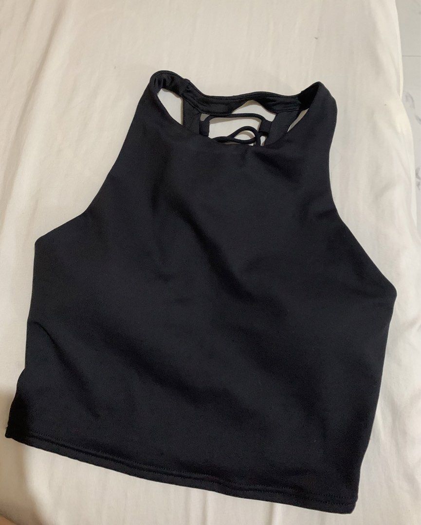 Alo Yoga Black Lace-Up Back Sports Bra (Category: Activewear) located in Bayombong. Submitted by birkensaddiction (Listing ID 1444861669, Image 2). Description: - Black Alo Yoga sports bra - Size: S - Features a cool lace-up detail on the back - High neckline for excellent support - Versatile: great for workouts or layering - Made in Vietnam.