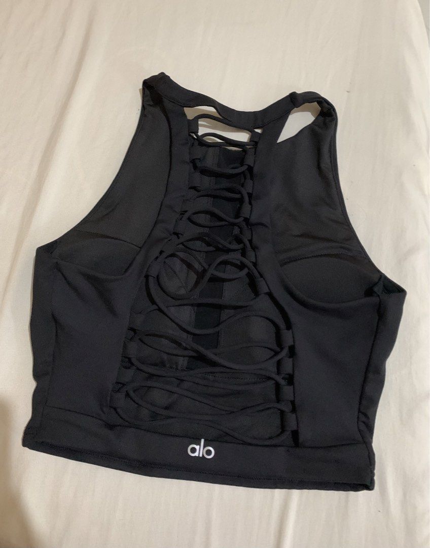 Alo Yoga Black Lace-Up Back Sports Bra (Category: Activewear) located in Bayombong. Submitted by birkensaddiction (Listing ID 1444861669, Image 3). Description: - Black Alo Yoga sports bra - Size: S - Features a cool lace-up detail on the back - High neckline for excellent support - Versatile: great for workouts or layering - Made in Vietnam.