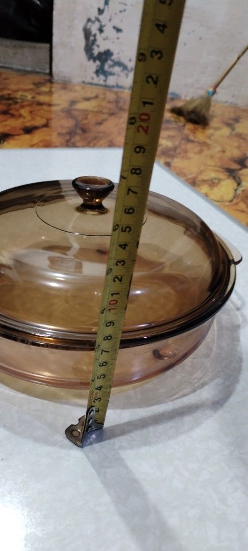 Amber Glass Casserole Dish with Lid (Category: Dinnerware & Cutlery) located in Caloocan City. Submitted by rowely_jpn (Listing ID 1444955518, Image 3). Description: Amber glass casserole dish. Comes with a matching glass lid. Great for baking or serving. Dishwasher safe. Measures approximately 8 inches in diameter and 4 inches deep. Perfect for your kitchen needs. Sturdy handles for easy carrying. Priority take all .vision and Pyrex ..