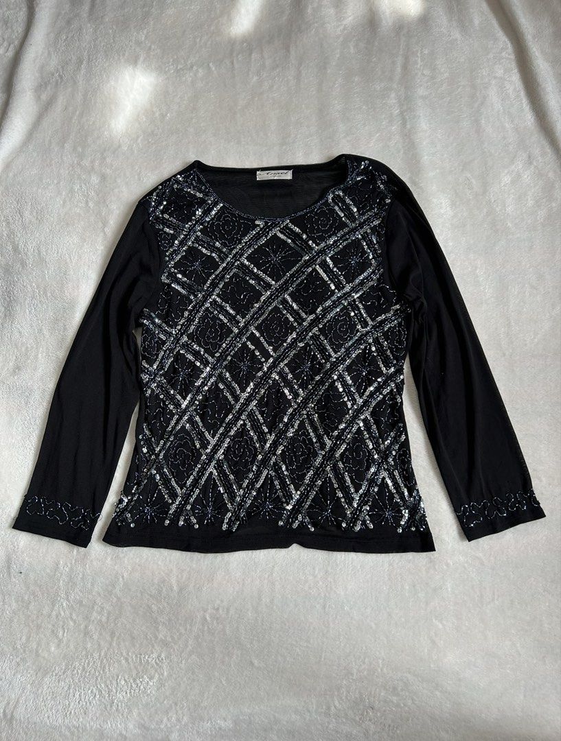 Ansel Classic Black Beaded Long Sleeve Top (Category: Longsleeves) located in Santa Ana. Submitted by 999h03 (Listing ID 1444872433, Image 1). Description: - Black long sleeve top -xs-m - Intricate silver and blue beadwork on front (diamond pattern with floral accents) - Sheer mesh sleeves - Slightly curved hemline - Ideal for night outs or special occasions.
