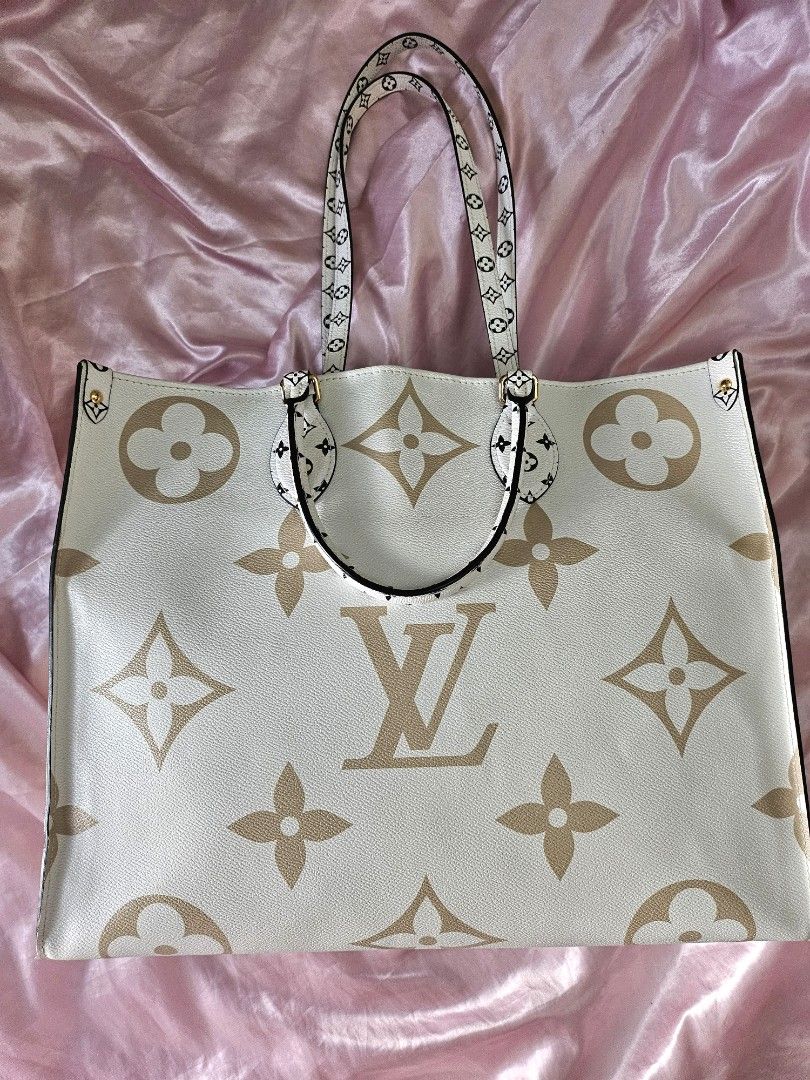 Authentic Louis Vuitton On the Go GM Bag (Category: Luxury Bags & Wallets) located in Rizal. Submitted by SummerPeaCloset (Listing ID 1445016688, Image 2). Description: Authentic LV OTG GM Tote Bag Php 121,000 With dustbag We are selling this authentic Louis Vuitton On the Go GM tote. The bag have been used lightly — it’s in good condition with minimal wear. The bag is made from genuine leather and canvas with the oversized LV monogram in olive g