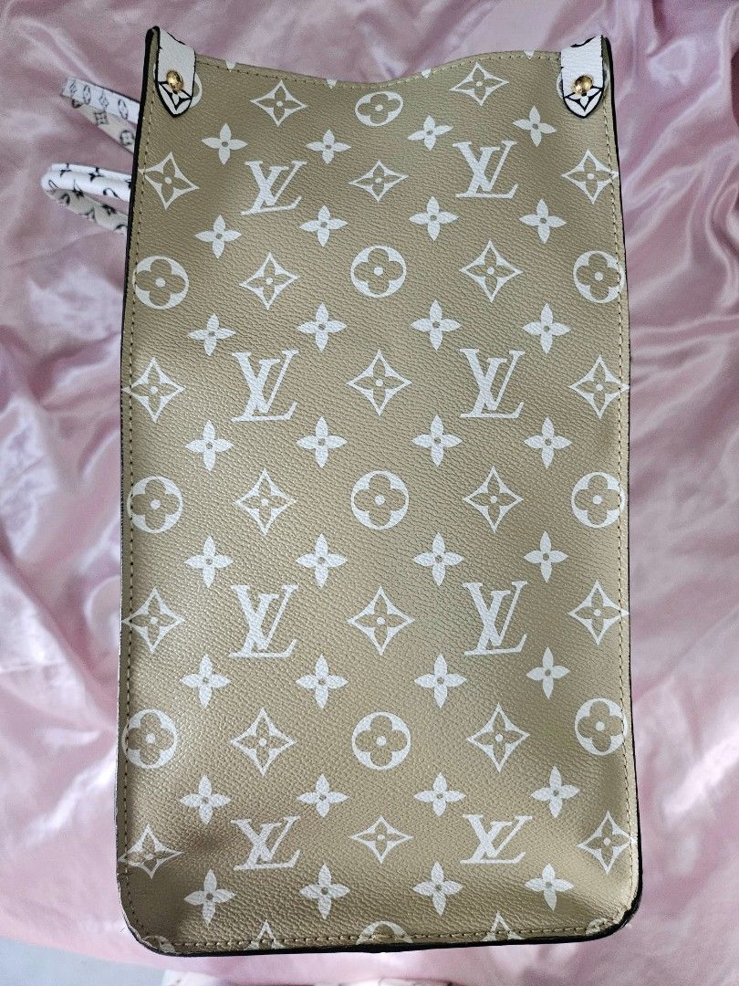 Authentic Louis Vuitton On the Go GM Bag (Category: Luxury Bags & Wallets) located in Rizal. Submitted by SummerPeaCloset (Listing ID 1445016688, Image 3). Description: Authentic LV OTG GM Tote Bag Php 121,000 With dustbag We are selling this authentic Louis Vuitton On the Go GM tote. The bag have been used lightly — it’s in good condition with minimal wear. The bag is made from genuine leather and canvas with the oversized LV monogram in olive g