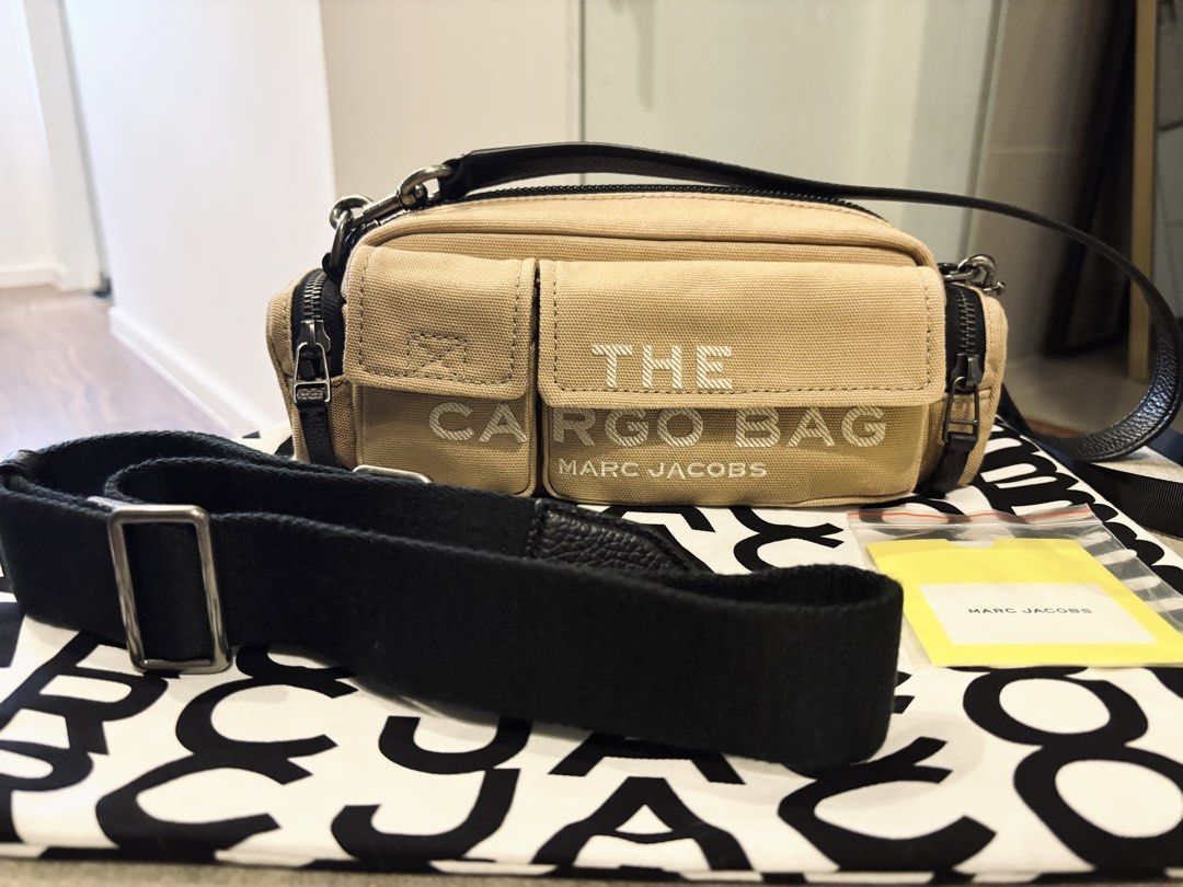 Authentic MARC JACOBS The Cargo Bag (Category: Luxury Bags & Wallets) located in Paranaque City. Submitted by mysinfulindulgence (Listing ID 1444873076, Image 3). Description: Guaranteed authentic MARC JACOBS The Cargo Bag with detachable short and long shoulder straps Retails for 22k @ MJ Greenbelt Very versatile Made of cotton and genuine leather Used 1-2x only and is in excellent like new condition Product measurements Width: 29 cm (11.41 in) 