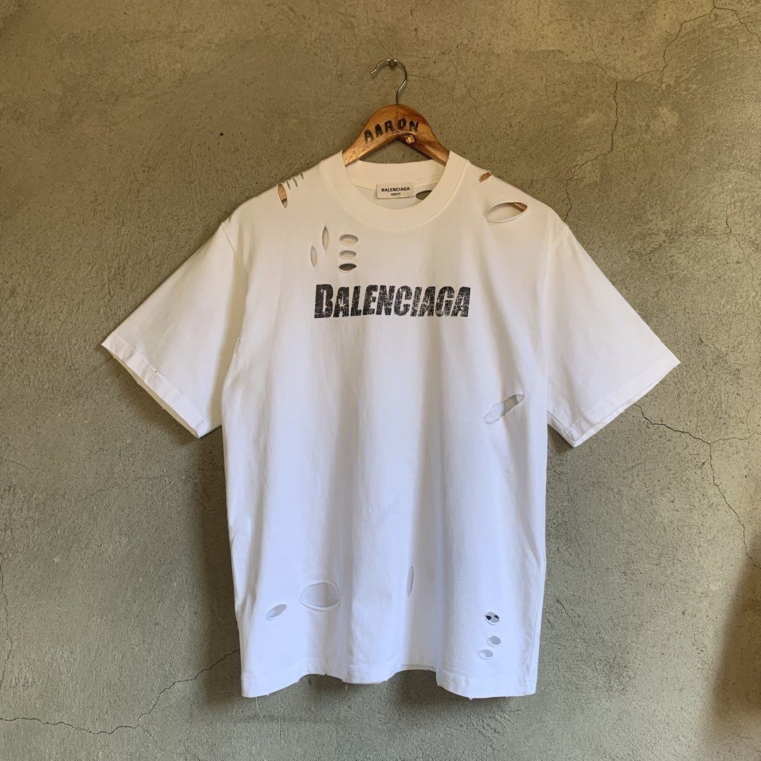 Balenciaga Distressed Shirt (Category: Tshirts & Polo Shirts ) located in Bauang. Submitted by asiolicious (Listing ID 1444943932, Image 1). Description: Condition: Excellent W: 21 L: 27 .
