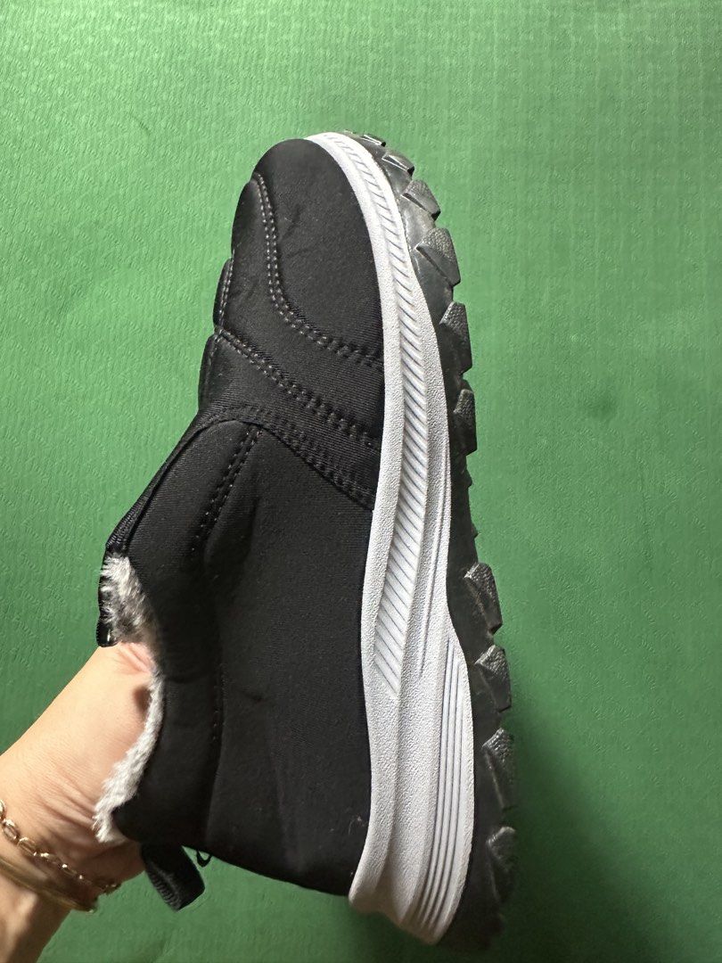 Black Fur Lined Slip-On Winter Boots Size 39 (Category: Boots) located in Quezon City. Submitted by declutter_incorporated (Listing ID 1444905975, Image 3). Description: - Comfy black slip-on boots - Soft grey faux fur lining for warmth - Durable sole with good grip - Easy to put on and take off - Ideal for cold weather - Size: 39 -Used once on a winter trip.