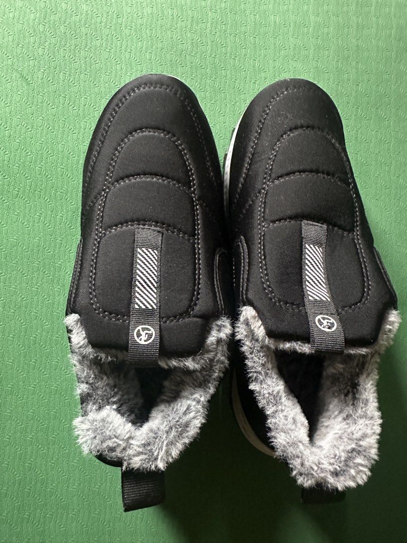 Black Fur Lined Slip-On Winter Boots Size 39 (Category: Boots) located in Quezon City. Submitted by declutter_incorporated (Listing ID 1444905975, Image 1). Description: - Comfy black slip-on boots - Soft grey faux fur lining for warmth - Durable sole with good grip - Easy to put on and take off - Ideal for cold weather - Size: 39 -Used once on a winter trip.