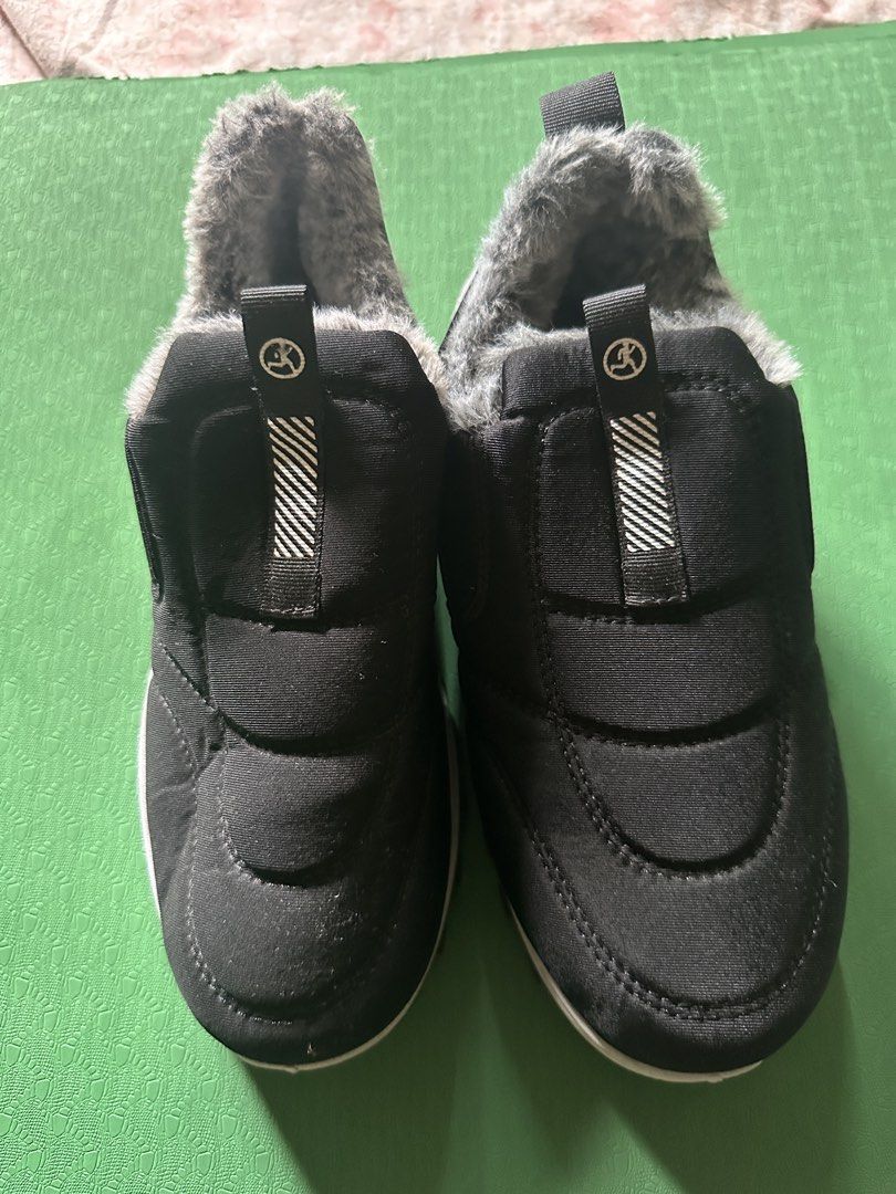 Black Fur Lined Slip-On Winter Boots Size 39 (Category: Boots) located in Quezon City. Submitted by declutter_incorporated (Listing ID 1444905975, Image 2). Description: - Comfy black slip-on boots - Soft grey faux fur lining for warmth - Durable sole with good grip - Easy to put on and take off - Ideal for cold weather - Size: 39 -Used once on a winter trip.