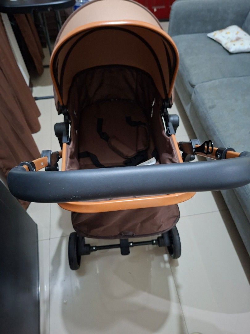 Brown Baby Stroller with Safety Harness (Category: Strollers) located in Manila. Submitted by iloveyou3ooo (Listing ID 1444992814, Image 1). Description: - Brown baby stroller - Secure 5-point safety harness - Metallic brown frame - Black wheels - Black and brown handlebar - Folds for convenient storage - Ideal for walks and travel.