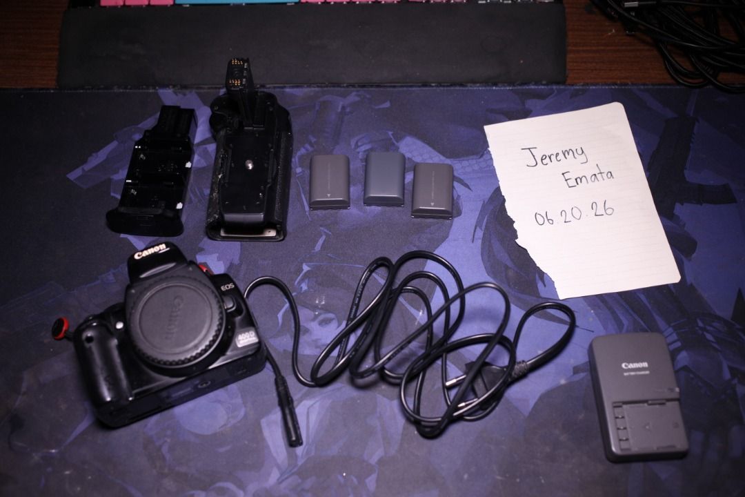 Canon EOS 400D + Battery Grip (Body Only) (Category: Cameras) located in Cainta. Submitted by technicallyrushing (Listing ID 1444927231, Image 1). Description: No lens included. Inclusions: * Canon EOS 400D body * Original battery grip * 2 original batteries + 1 replacement battery * Charger * Eyecup * Body cap Issues: * Original batteries are weak (replacement battery holds charge fine) * Some signs of wear Note: Peak Design Anchor and plate NOT